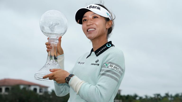 Lydia Ko, of New Zealand, poses with the trophy after winning the LPGA CME Group Tour Championship golf tournament, Sunday, Nov. 20, 2022, at the TiburÛn Golf Club in Naples, Fla. 