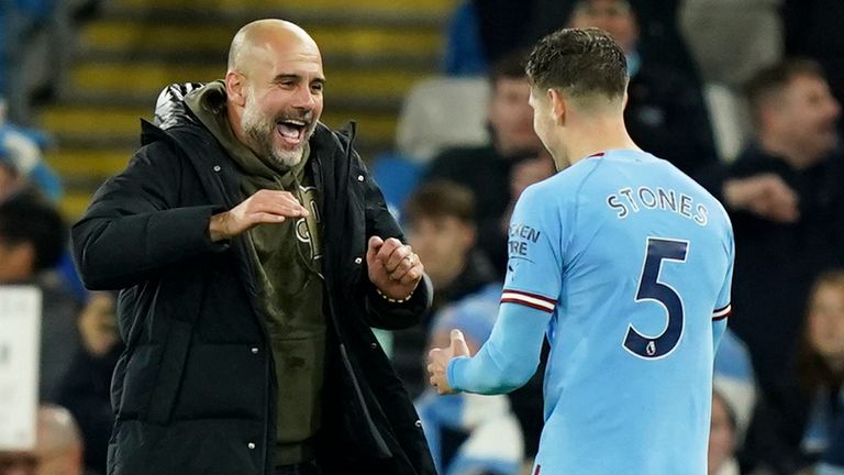 Man City&#39;s head coach Pep Guardiola celebrates