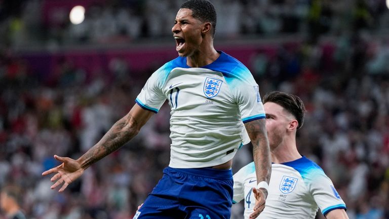 England's Marcus Rashford celebrates after scoring the opening goal