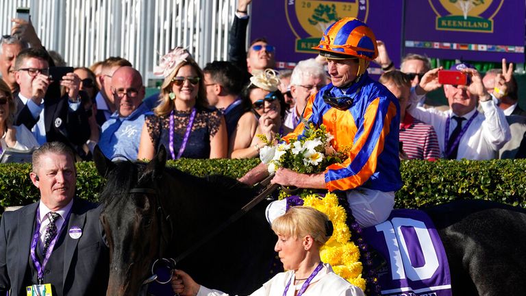 Ryan Moore is led back into the winner&#39;s enclosure at the Breeders&#39; Cup on Meditate