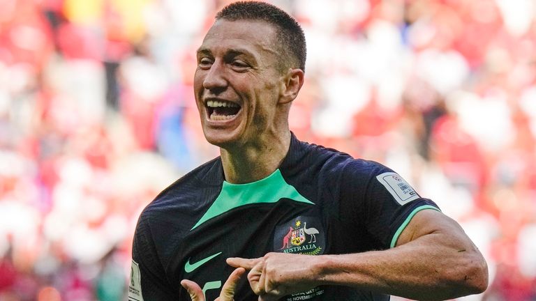 Australia's Mitchell Duke celebrates after he scored the opening goal during the World Cup group D soccer match between Tunisia and Australia at the Al Janoub Stadium in Al Wakrah, Qatar, Saturday, Nov. 26, 2022. (AP Photo/Luca Bruno)