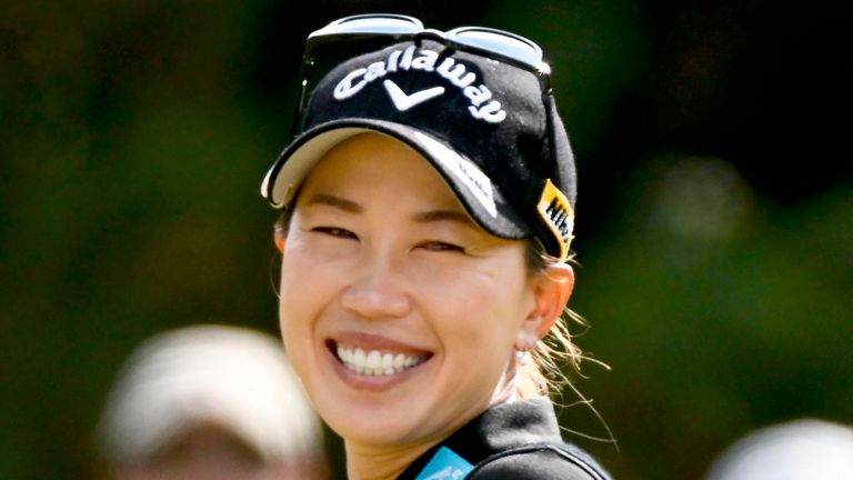 Momoko Ueda of Japan, left, chats with Miyu Yamashita of Japan during the LPGA Tour's Toto Japan Classic at the Seta Golf Club in Shiga, Japan Saturday, Nov. 5, 2022. (Kyodo News via AP)