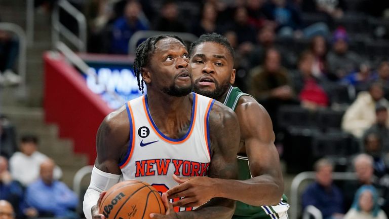 New York Knicks forward Julius Randle (30) is defended by Detroit Pistons center Isaiah Stewart during the second half of an NBA basketball game, Tuesday, Nov. 29, 2022, in Detroit. (AP Photo/Carlos Osorio)