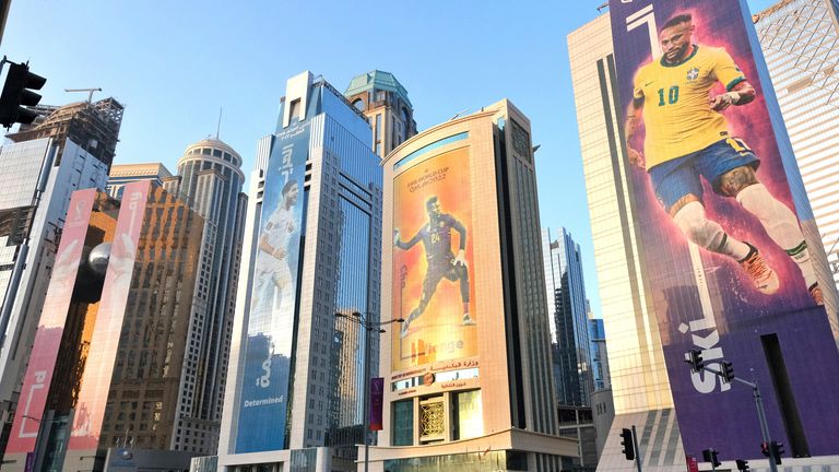 An image of Neymar is displayed on skyscrapers in Doha