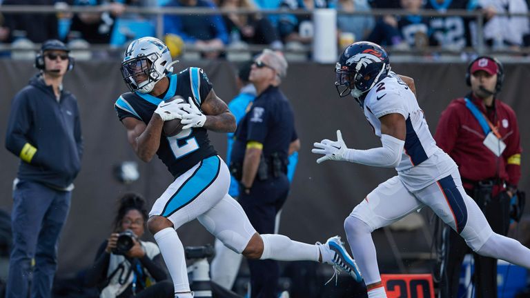 Carolina Panthers wide receiver DJ Moore (2) catches a pass in front of Denver Broncos cornerback Pat Surtain II (2) during an NFL football game, Sunday, Nov. 27, 2022, in Charlotte, N.C. (AP Photo/Brian Westerholt)


