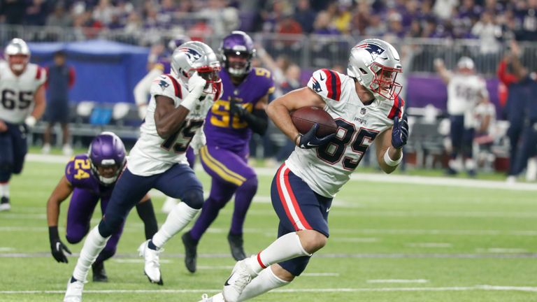 New England Patriots tight end Hunter Henry (85) runs up field during a 37-yard touchdown reception in the second half of an NFL football game against the Minnesota Vikings, Thursday, Nov. 24, 2022, in Minneapolis. (AP Photo/Bruce Kluckhohn)


