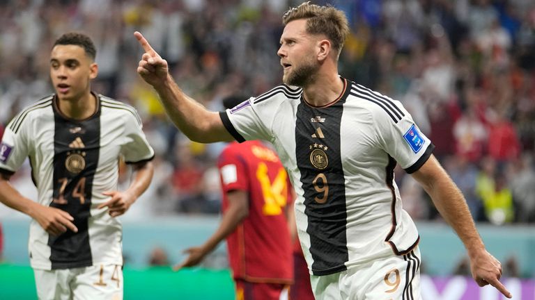 Niclas Fullkrug celebrates after he equalises for Germany