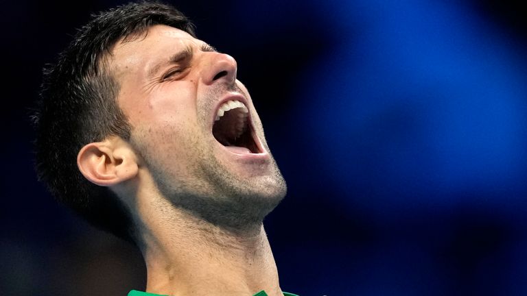 Serbia's Novak Djokovic celebrates after winning against Russia's Daniil Medvedev in their singles tennis match at the ATP World Tour Finals, at the Pala Alpitour in Turin, Italy, Friday, Nov.  18, 2022. (AP Photo Antonio Calani) 