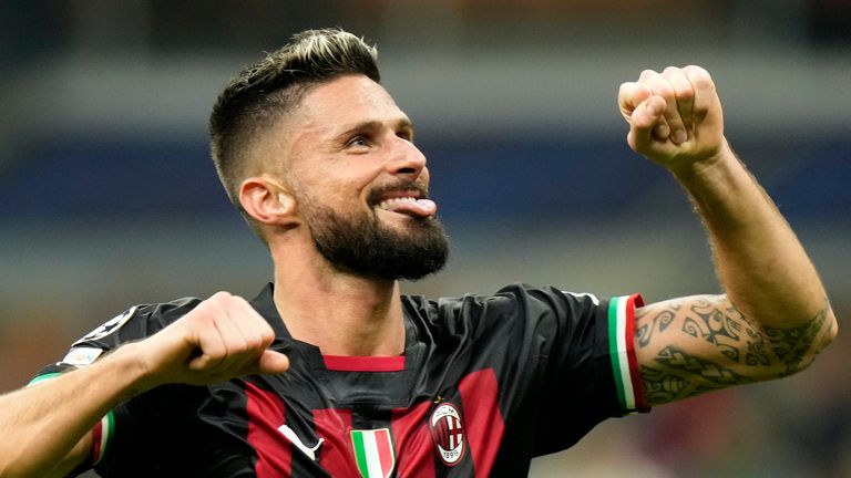 AC Milan&#39;s Olivier Giroud celebrates at the end of the Champions League, Group E soccer match between AC Milan and FC Salzburg, at the San Siro stadium in Milan, Italy, Wednesday, Nov. 2, 2022. (AP Photo/Luca Bruno)