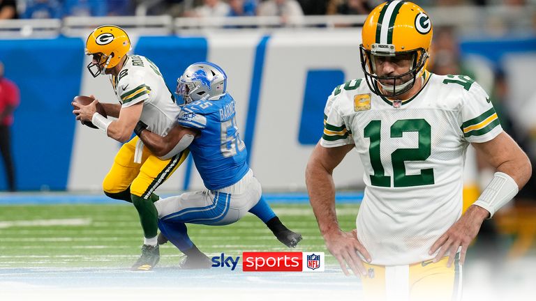 Green Bay Packers quarterback Aaron Rodgers is sacked by Detroit Lions linebacker Derrick Barnes