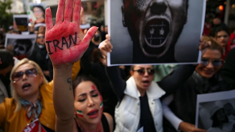 Iranian women protest over the death of Mahsa Amini during a demonstration outside the Iranian consulate in Istanbul