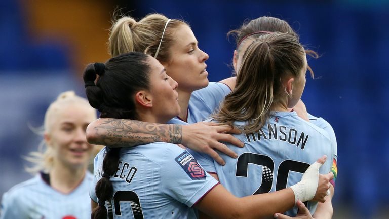 Rachel Daly is mobbed after scoring from the penalty spot against Liverpool