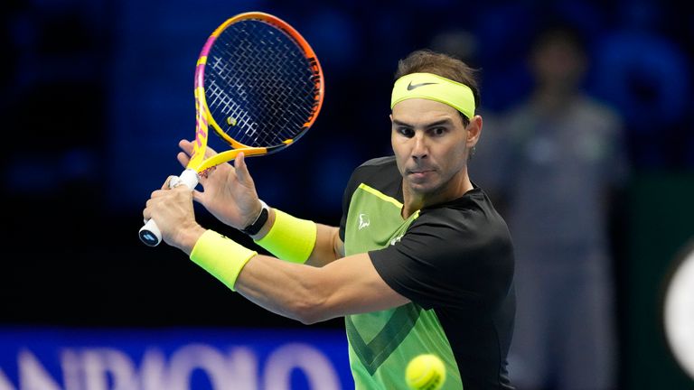 Spain's Rafael Nadal returns the ball to United States' Taylor Fritz during their singles tennis match of the ATP World Tour Finals, at the Pala Alpitour in Turin, Italy, Sunday, Nov. 13, 2022. (AP Photo/Antonio Calanni)