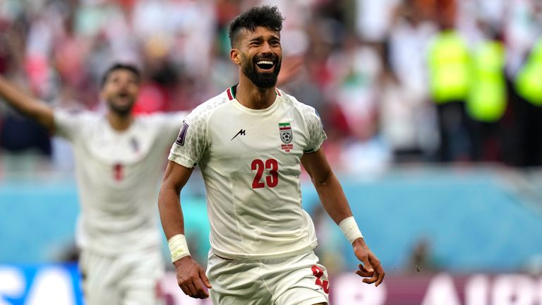 Ramin Rezaeian celebrates after scoring Iran&#39;s second goal