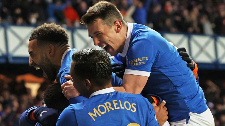 GLASGOW, SCOTLAND - FEBRUARY 24: Rangers Conor Goldson, Alfredo Morelos and Ryan Jack celebrates James Tavernier's second goal during a UEFA Europa League  Play Off second leg match between Rangers and Borussia Dortmund at Ibrox Stadium, on February 24, 2022, in Glasgow, Scotland (Photo by Alan Harvey / SNS Group)