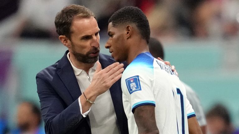 Marcus Rashford speaks to Gareth Southgate