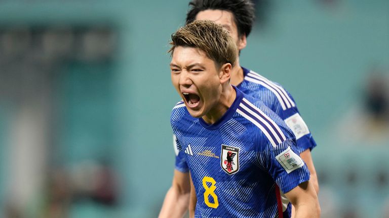 Japan's Ritsu Doan celebrates after scoring his side's equaliser