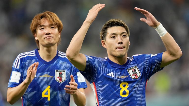 Japan&#39;s Ritsu Doan (right) celebrates after scoring his side&#39;s opening goal against Germany