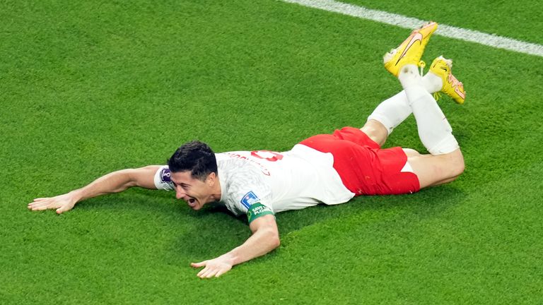 Robert Lewandowski celebrates scoring Poland's second goal of the game 