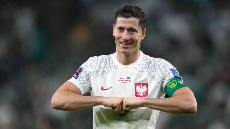 Robert Lewandowski celebrates after scoring Poland&#39;s second goal