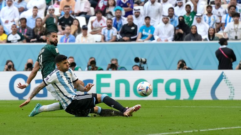 Saudi Arabia's Saleh Al-Shehri scores his side's opening goal