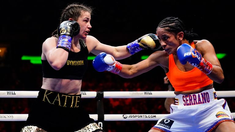Ireland's Katie Taylor, left, fights Amanda Serrano during the fourth round of a lightweight championship boxing match Saturday, April 30, 2022,  in New York. Taylor won the bout. (AP Photo/Frank Franklin II)