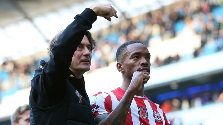 Thomas Frank and Ivan Toney celebrate at full time following the 2-1 win over Man City