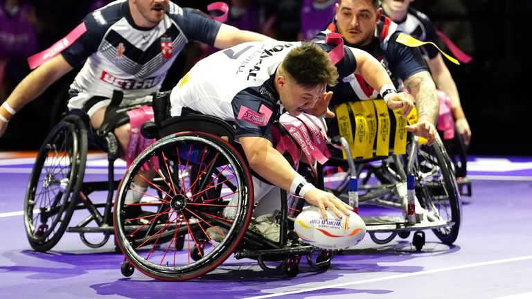 England v France - Wheelchair Rugby League World Cup - Final - Manchester Central
England's Tom Halliwell scores their side's fifth try of the game during the Wheelchair Rugby League World Cup final match at Manchester Central. Picture date: Friday November 18, 2022.