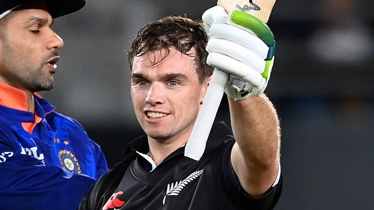 New Zealand&#39;s Tom Latham celebrates his century against India during their one day international cricket match in Auckland, New Zealand, Friday, Nov. 25, 2022. (Andrew Cornaga/Photosport via AP)