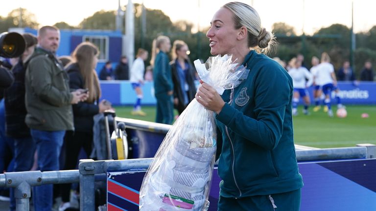 Toni Duggan receives gifts at an Everton match after announcing her pregnancy 