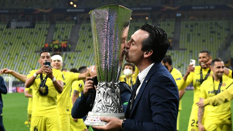 Villarreal manager Unai Emery kisses the trophy after the UEFA Europa League final, at Gdansk Stadium, Poland. Picture date: Wednesday May 26, 2021.