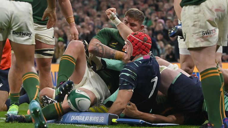 Josh van der Flier celebrates his crucial try via a rolling maul 