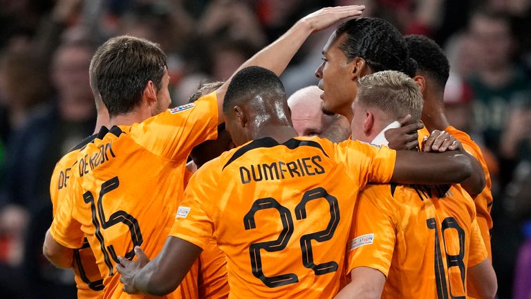 Netherlands&#39; Virgil van Dijk celebrates with teammates after scoring his sides first goal during the UEFA Nations League soccer match between the Netherlands and Belgium at the Johan Cruyff ArenA in Amsterdam, Netherlands, Sunday, Sept. 25, 2022. (AP Photo/Peter Dejong)
