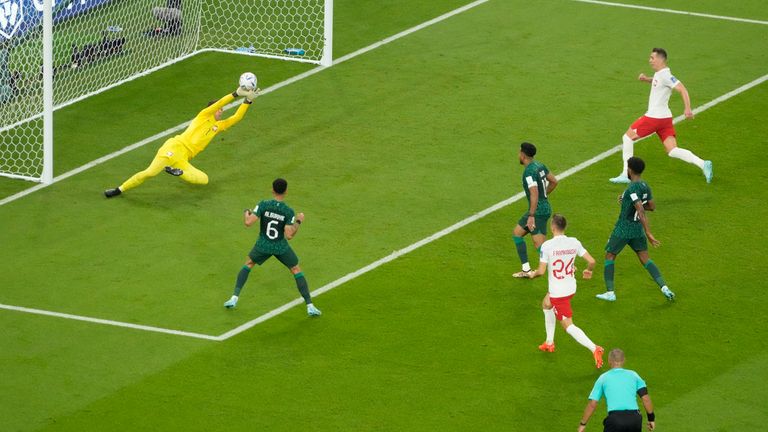 Wojciech Szczesny makes a double save after Saudi Arabia were awarded a penalty