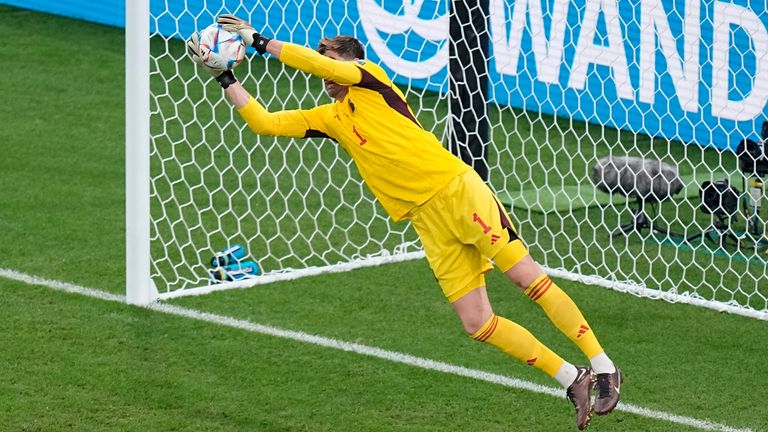 Thibaut Courtois saves Jonathan David's header