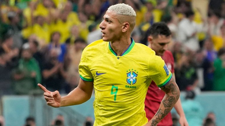 Richarlison celebrates after scoring his second goal against Serbia