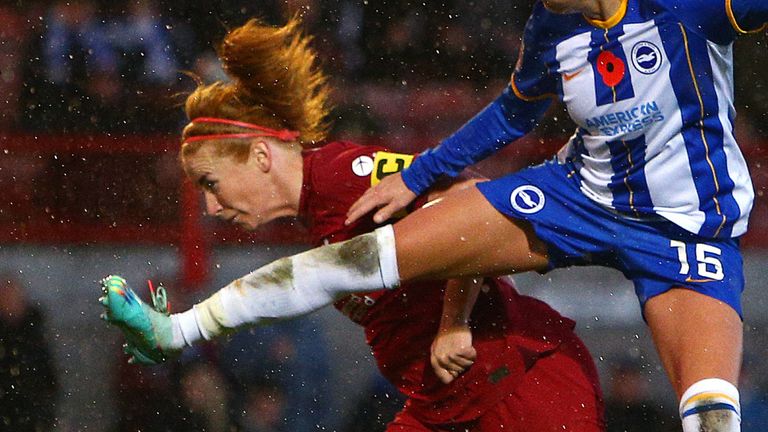 Rachel Furness stoops to head home a late equaliser for Liverpool against Brighton