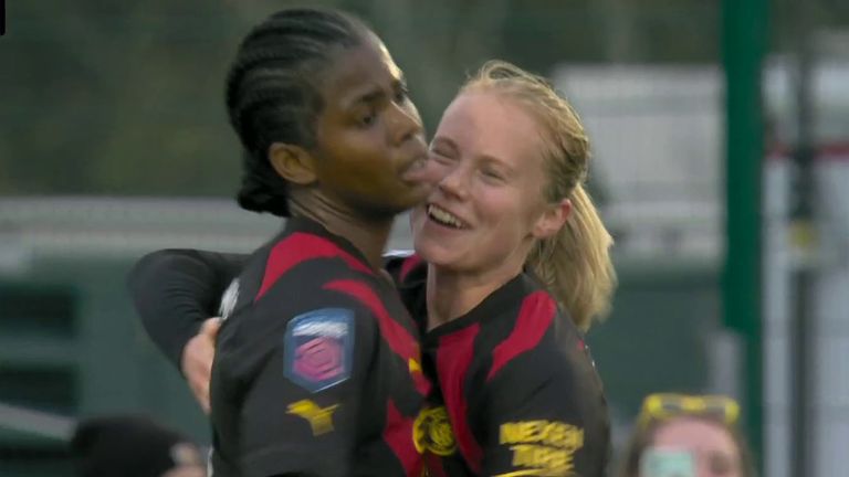 Julie Blakstad celebrates with Bunny Shaw after opening the scoring for Manchester City