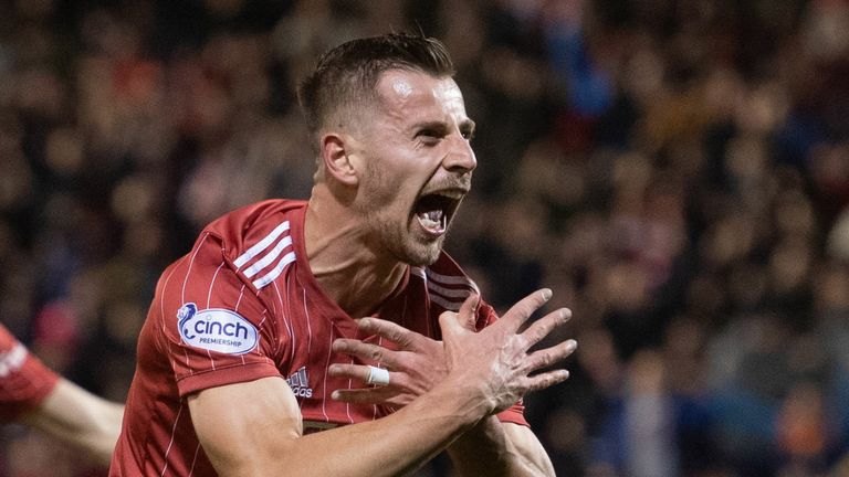 ABERDEEN, SCOTLAND - NOVEMBER 04: Aberdeen&#39;s Ylber Ramadani celebrates after making it 3-0 during a cinch Premiership match between Aberdeen and Hibernian at Pittodrie, on November 04, 2022, in Aberdeen, Scotland.  (Photo by Craig Foy / SNS Group)