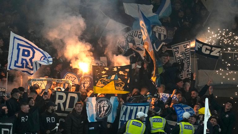 Zurich fans in the stands let off flares