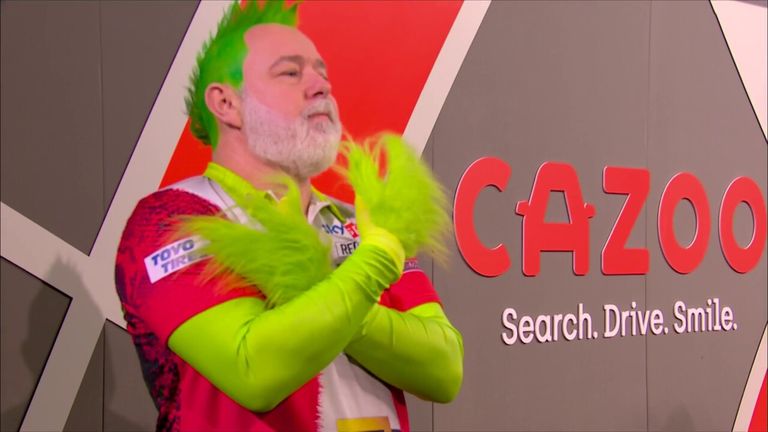 Watch Peter Wright and his 'Grinch' walk-on against Mickey Mansell on the opening night of the World Championship