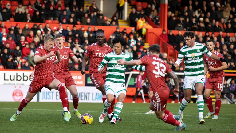 ABERDEEN, SCOTLAND - DECEMBER 17: Celtic's Reo Hatate has a shot in the first half during a cinch Premiership match between Aberdeen and Celtic  at Pittodrie, on December 17, 2022, in Aberdeen, Scotland.  (Photo by Alan Harvey / SNS Group)