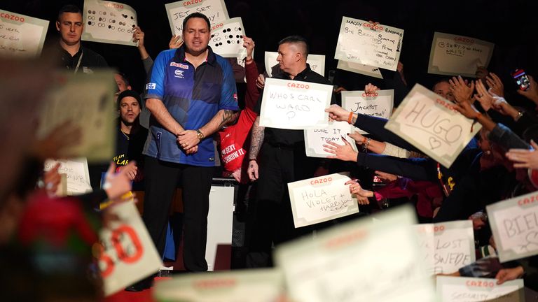 England's Adrian Lewis walks out to play against Sweden's Daniel Larsson during day two of the Cazoo World Darts Championship at Alexandra Palace, London. Picture date: Friday December 16, 2022.