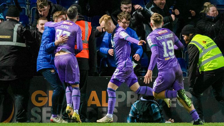 DINGWALL, SCOTLAND -  DECEMBER  17: St Johnstone&#39;s Ali Crawford (C) celebrates scoring to make it 2-1 with his teammates during a cinch Premiership match between Ross County and St Johnstone at the Global Energy Stadium, on December 17 , 2022, in Dingwall, Scotland (Photo by Paul Devlin / SNS Group)