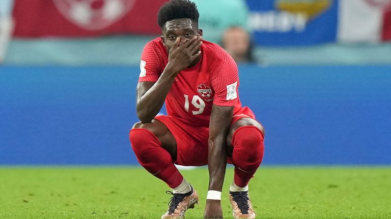 Canada forward Alphonso Davies (19) reacts after a loss to Morocco in a group F World Cup soccer match at the Al Thumama Stadium in Doha, Qatar on Thursday, Dec. 1, 2022. (Nathan Denette/The Canadian Press via AP)