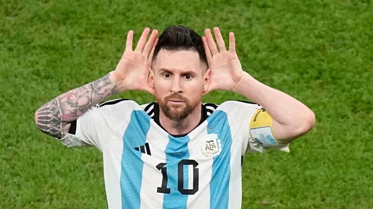 Lionel Messi celebrates after scoring from the penalty spot