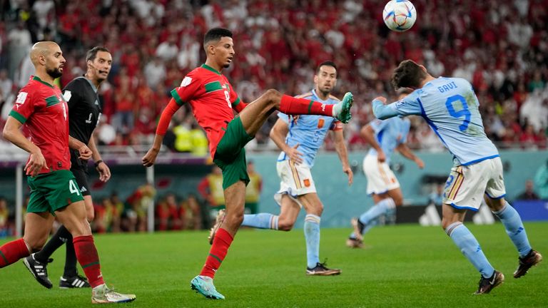Morocco's Azzedine Ounahi challenges Spain's Gavi in the last 16 tie