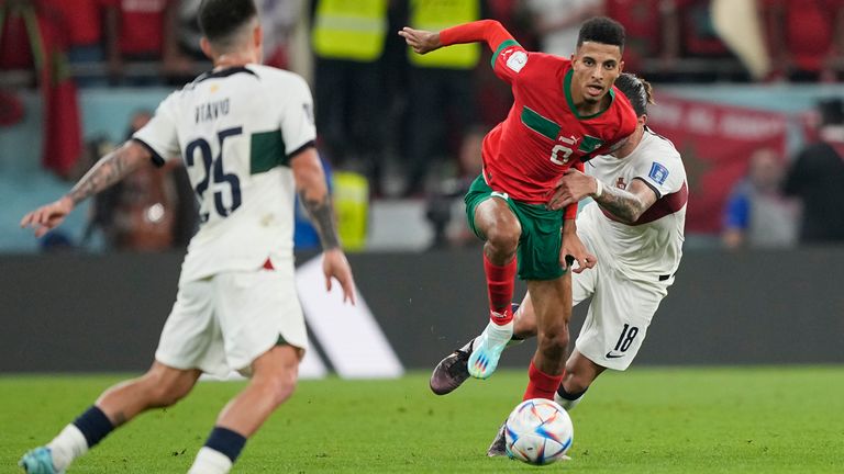 Morocco's Azzedine Ounahi skips past Portugal's Ruben Neves