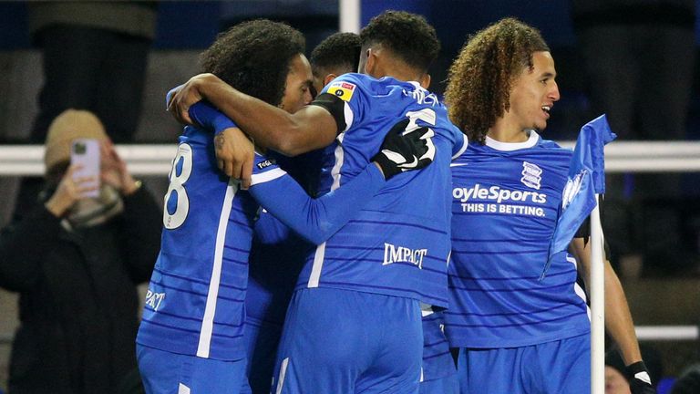 Birmingham's Troy Deeney celebrates with team-mates after scoring against Reading