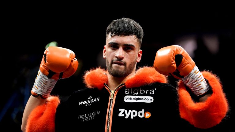 Adam Azim celebrates after knocking out Jordan Ellison in the third round to win the Super-Lightweight Contest fight at the AO Arena, Manchester. Picture date: Saturday February 19, 2022.